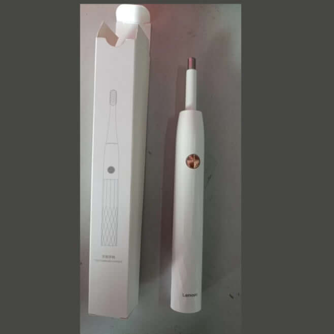 Electric toothbrush with magnetic fast charging base and waterproof design, ideal for efficient dental care.