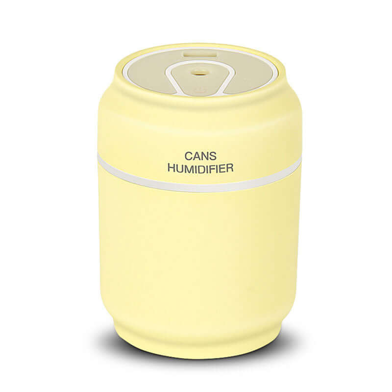 Compact yellow mini humidifier designed to resemble a can, with 200ml capacity and silent operation under 36dB.