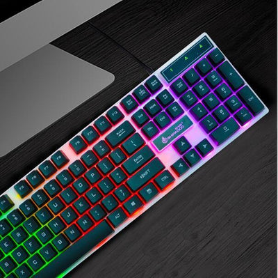 Wangtun Shanhe stylish RGB keyboard with angular design and bright, colorful backlighting on a desk.