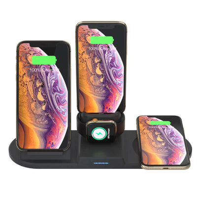 Wireless charger with three smartphones and a smartwatch, fully charged and displaying charging status.