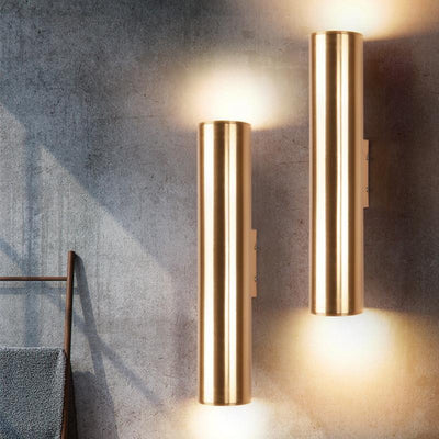 Iron vintage wall lamp in a modern setting, featuring LED light and aluminum shade against a textured wall.