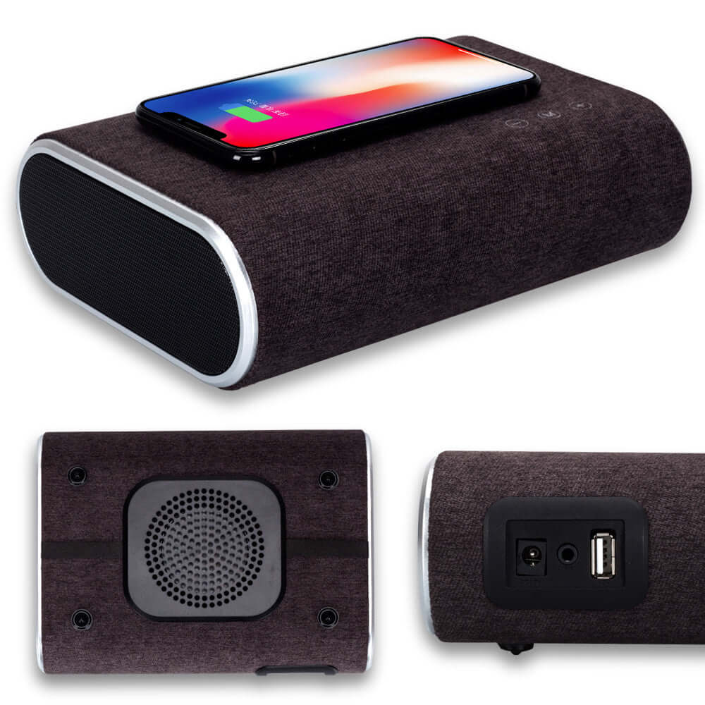 Wireless charger speaker in dark brown, featuring Bluetooth capabilities and a phone charging on top.