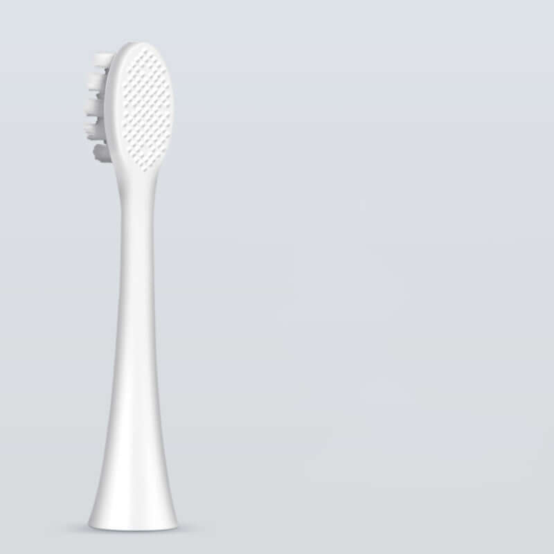 Replacement brush head for electric toothbrush, designed for optimal cleaning and oral care.