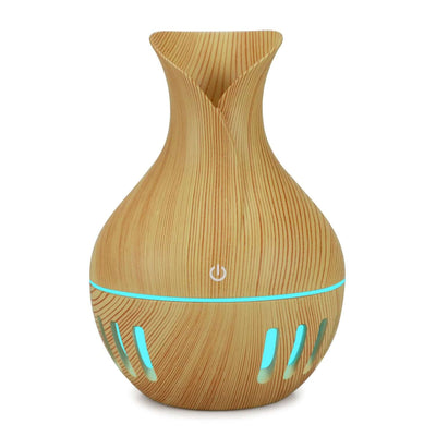 Hollow colorful mini USB humidifier in wood grain design with LED light, 130ml capacity, ideal for small spaces.