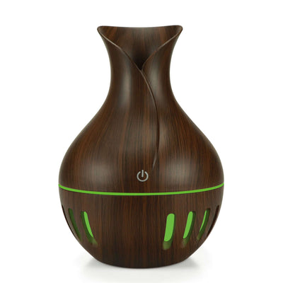Hollow Colorful Mini USB Humidifier in wood design with LED light, 130ml capacity, stylish and portable for home use.
