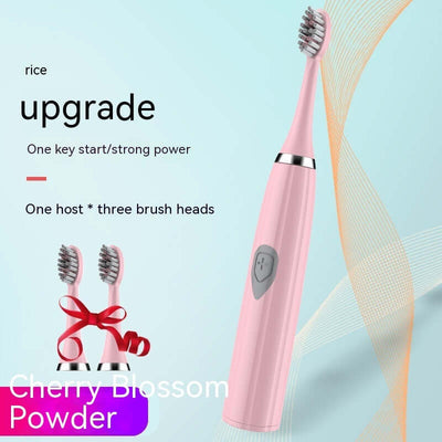 Electric toothbrush in cherry blossom powder color with three brush heads and strong power features.