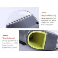 Close-up of the Pet Treat Launcher showing the transparent cap and wide injection port for easy treat loading.