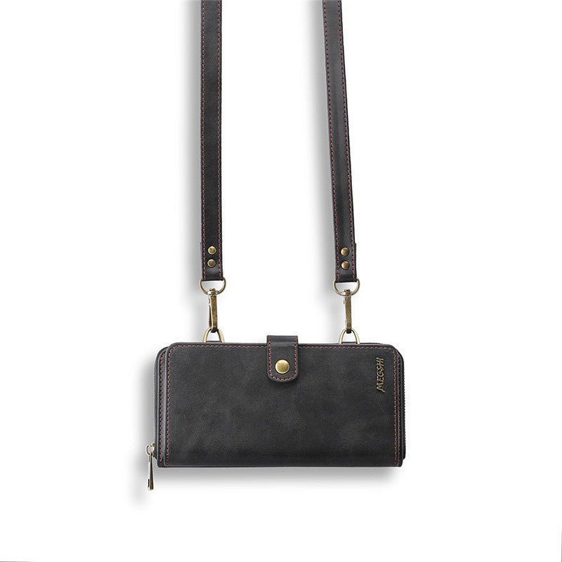 Detachable black leather wallet with strap, stylish design for carrying essentials securely.