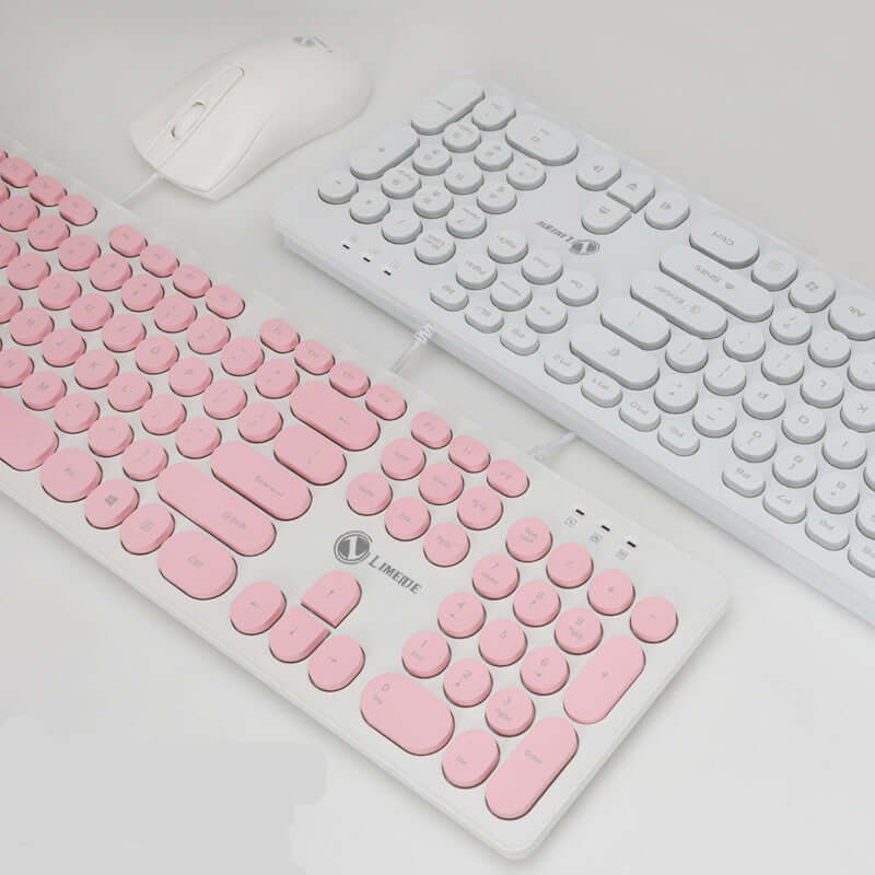 Punk keyboard and mouse set in pink and white, featuring a USB interface and 104 mute keys, perfect for general use.