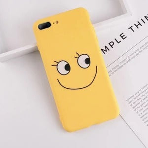 Yellow smiley face iPhone case with a fun design, made of TPU material for protection against scratches and daily damage.