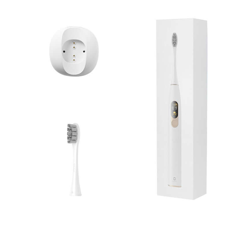Electric toothbrush with charging base and replacement brush head, featuring a sleek design and efficient cleaning capabilities.