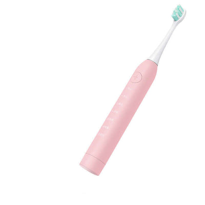 Pink electric toothbrush with a button control, featuring multiple cleaning modes and inductive charging.