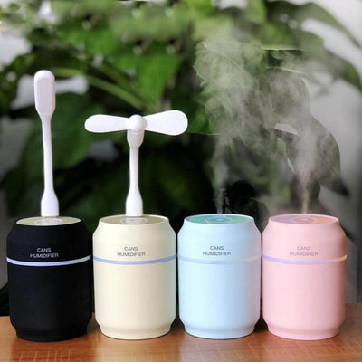 Mini humidifiers in various colors with mist and fan, showcasing waterproof design and low noise operation.