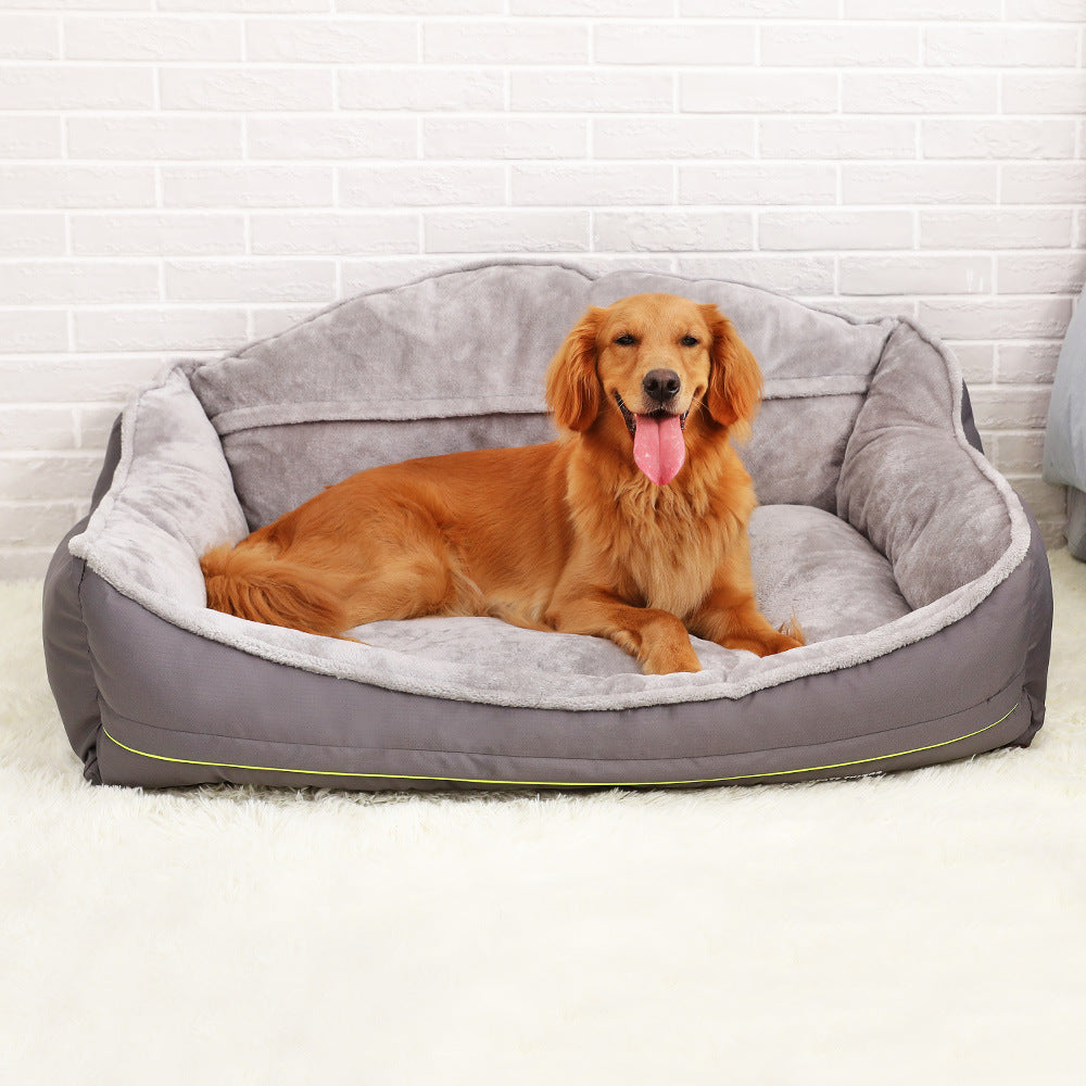 Golden retriever lounging on a cozy grey portable dog bed, featuring a soft mattress for comfort and warmth.