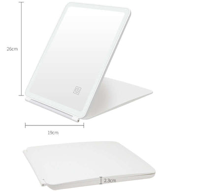 Clamshell desktop LED dressing mirror with touch control, white frame, dimensions 26x19 cm, perfect for bedrooms and bathrooms.