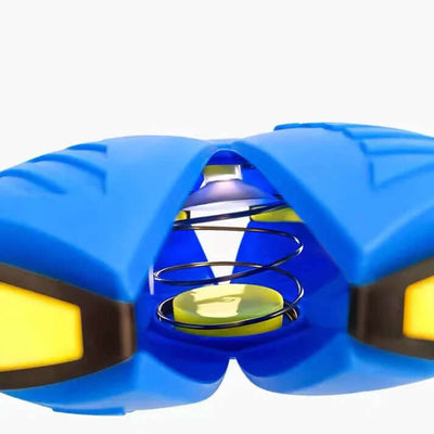 Close-up of a durable blue dog frisbee featuring a spring mechanism for enhanced playtime and fun.