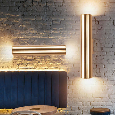 Iron vintage wall lamp with LED light on a textured wall, showcasing modern design and warm ambiance.
