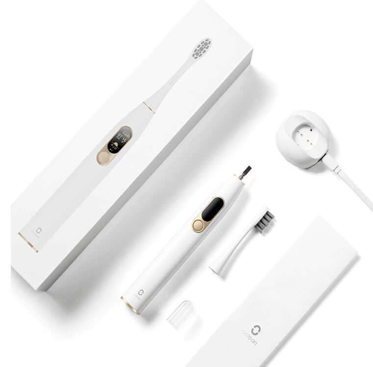 Electric toothbrush with magnetic fast charging base, accessories, and sleek packaging for effective dental care.