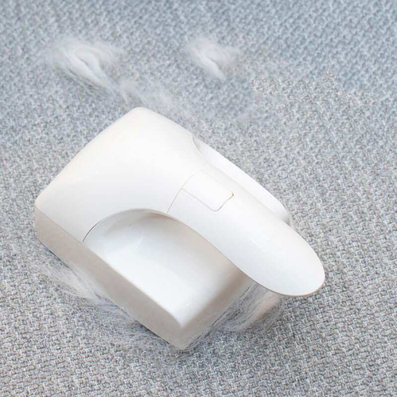 Pet Products Sticky Hair Remover designed for efficient cat hair removal, featuring a white ABS handle and cleaning pad.