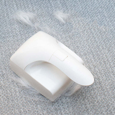 Pet Products Sticky Hair Remover designed for efficient cat hair removal, featuring a white ABS handle and cleaning pad.