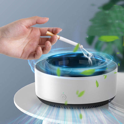 Hand using a cigarette over an intelligent ashtray, promoting cleaner air and a healthier lifestyle.