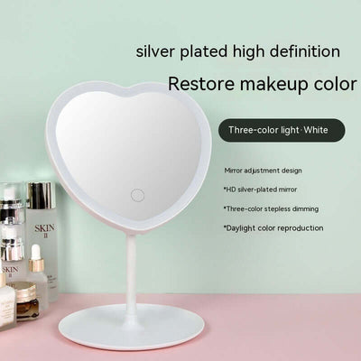 Heart-shaped LED makeup mirror with silver plating, three-color light, ideal for precise makeup application.