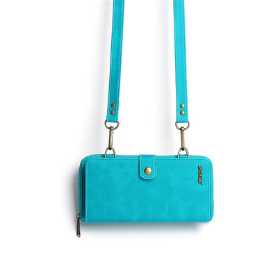 Turquoise detachable wallet with shoulder strap, stylish and functional for on-the-go convenience.