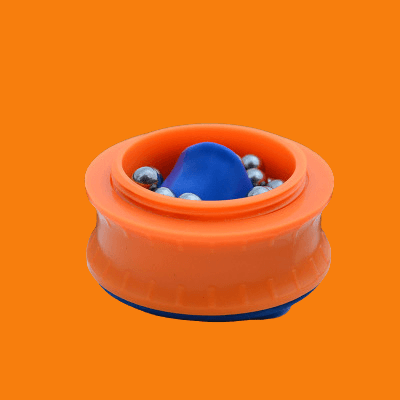 Bright orange slingshot cup with blue inside and metal balls, perfect for easy and powerful slingshot action.