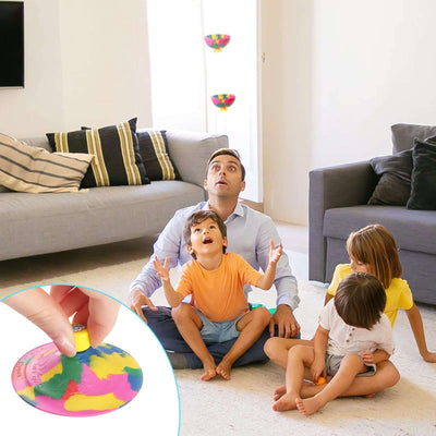 Family enjoys playing with colorful Fidget Bouncer at home, creating fun memories together.