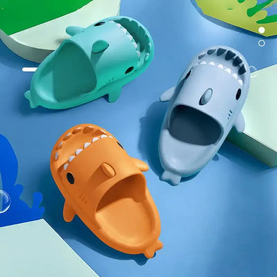 Colorful shark slides in blue, green, and orange on a fun, playful background for stylish comfort.