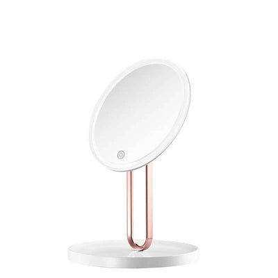 Desktop LED makeup mirror with light in cherry blossom pink and ivory white, featuring a glass lens and stylish ABS frame.