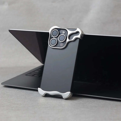 Zinc alloy protective case for iPhone 15 series in minimalist design with elegant black finish.