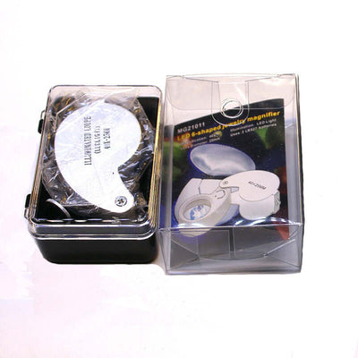 Folding jewelry mirror with LED light in packaging, featuring a black box and clear PVC case for easy visibility.
