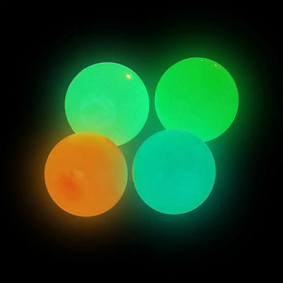 Colorful sticky glow balls in orange and green, perfect for fun late-night activities.