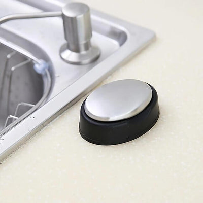 Stylish odour removing steel soap placed beside kitchen sink for effective odour elimination after cooking.