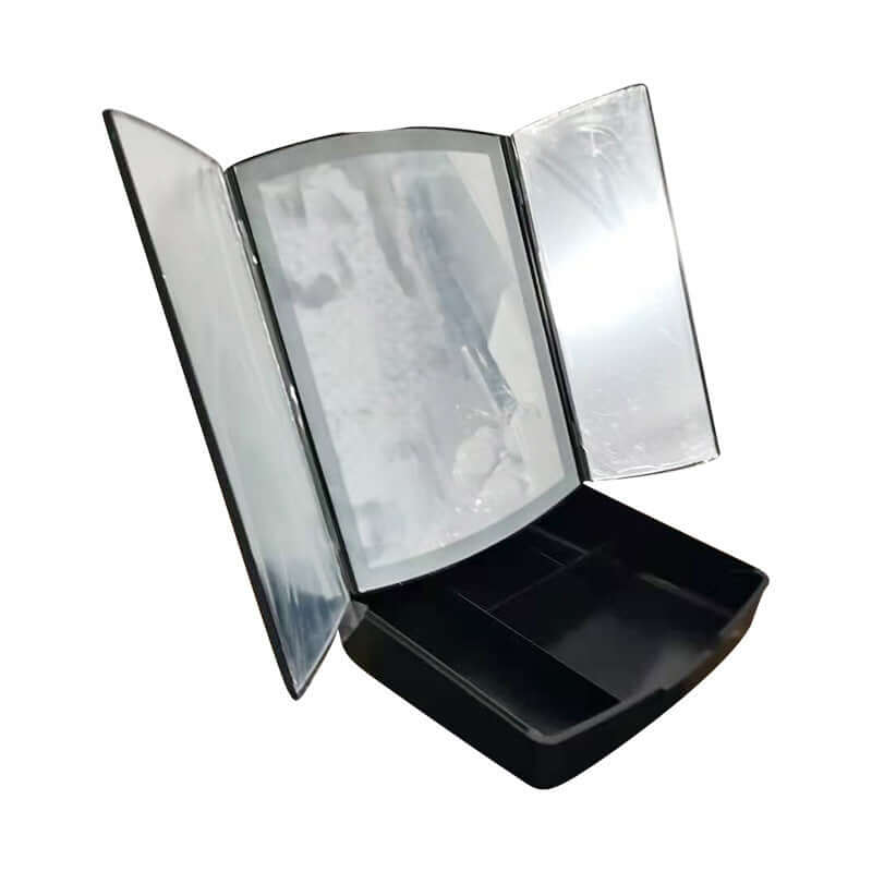 Household LED folding makeup mirror with light in black color, featuring a tri-fold design and storage compartment.
