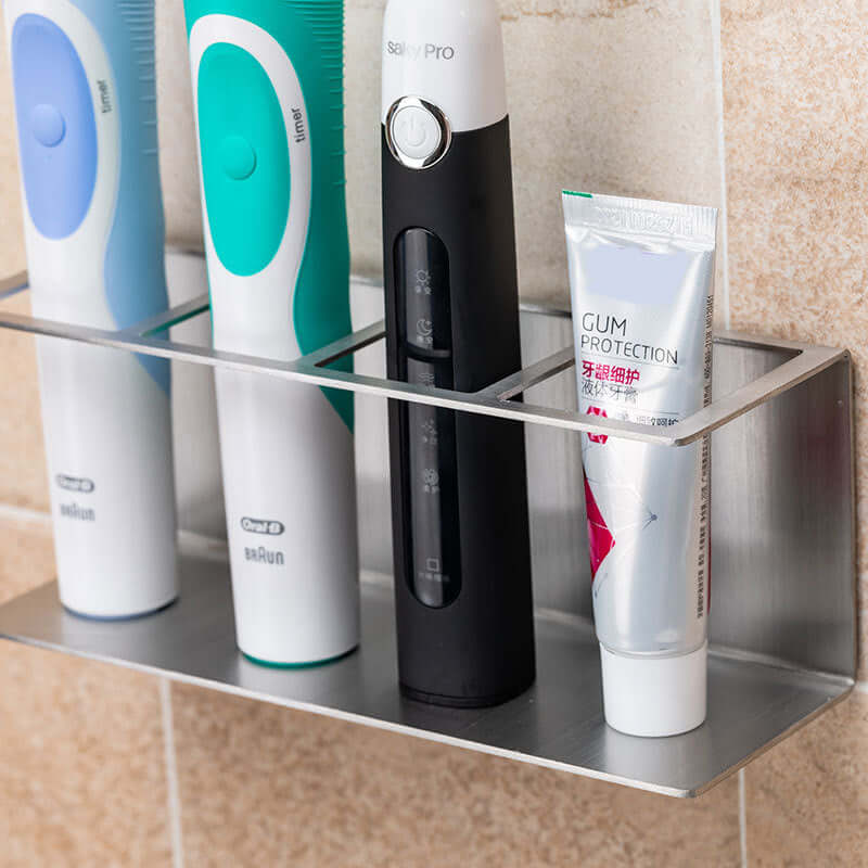 Stylish stainless steel electric toothbrush holder in European style with toothpaste, accommodating multiple toothbrushes.