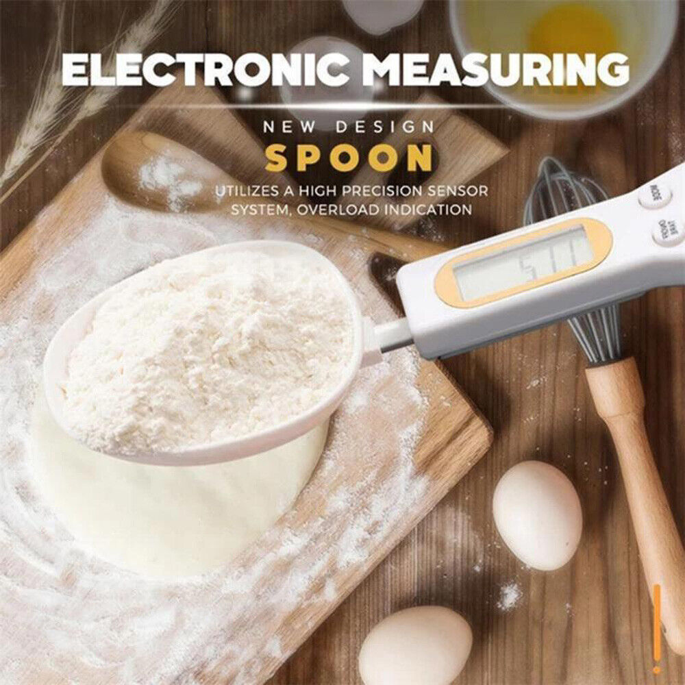 LCD digital kitchen scale spoon measuring flour with backlit display and high precision sensor on wooden countertop.